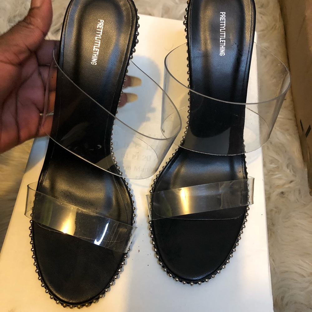 Pretty little things heels lightly worn . Size 7
